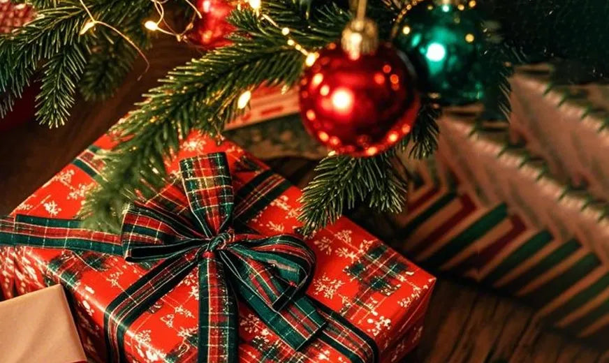Decorative Christmas scene with wrapped presents and a tree.