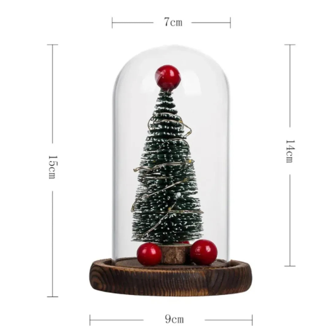 Small Christmas tree with red balls under a glass dome on a wooden base, with measurements indicated.