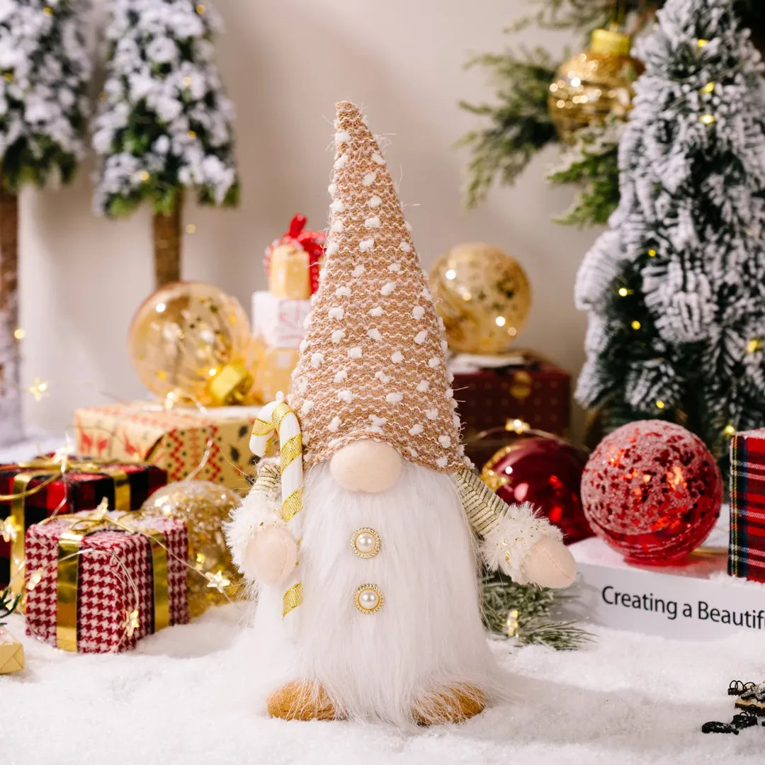 Decorative gnome with a gold hat in a festive setting with Christmas trees and presents.